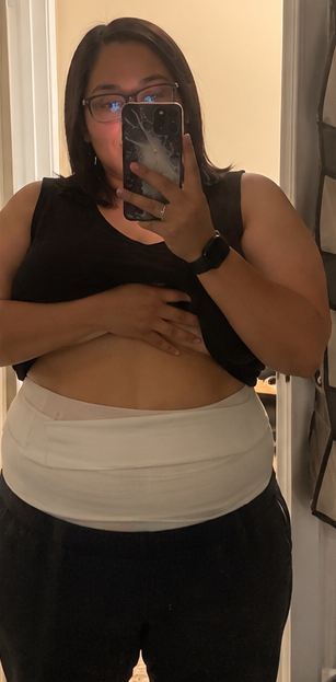 Gaby three days after bariatric surgery wearing an abdominal binder before heading home.